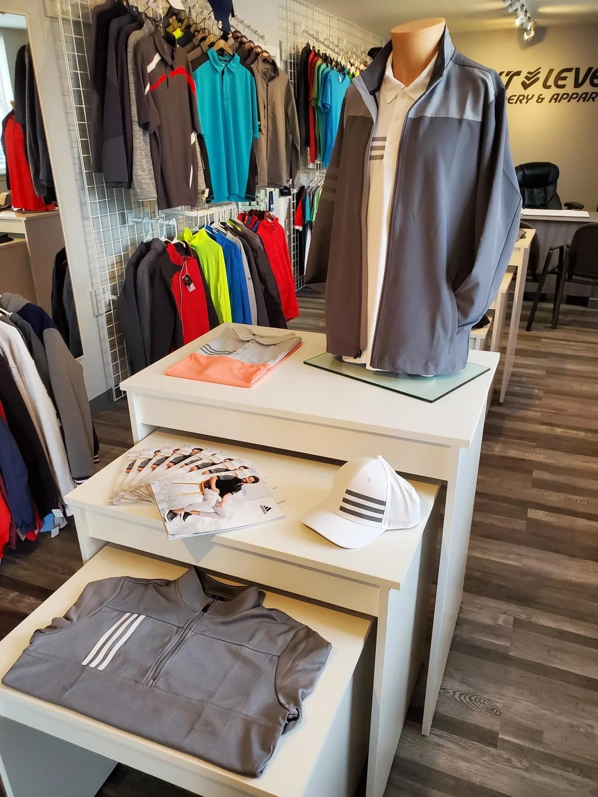 Folded shirts on showroom display tables